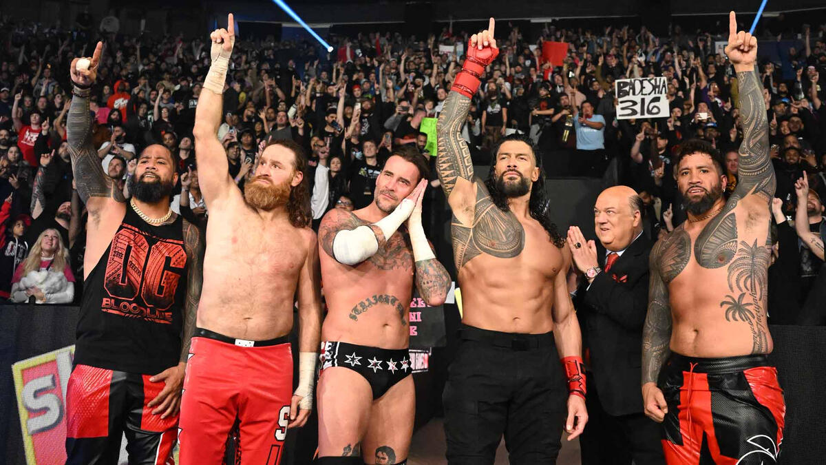 Jimmy Uso, Sami Zayn, CM Punk, Roman Reigns, Paul Heyman & Jey Uso