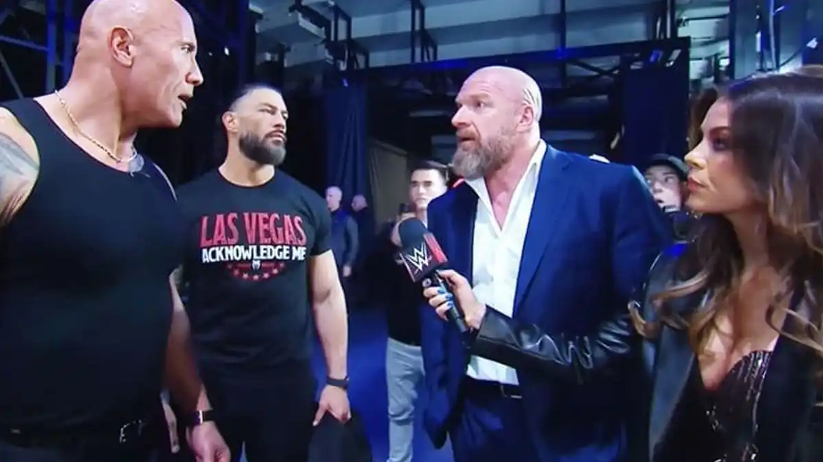 The Rock, Roman Reigns, Triple H & Jackie Redmond